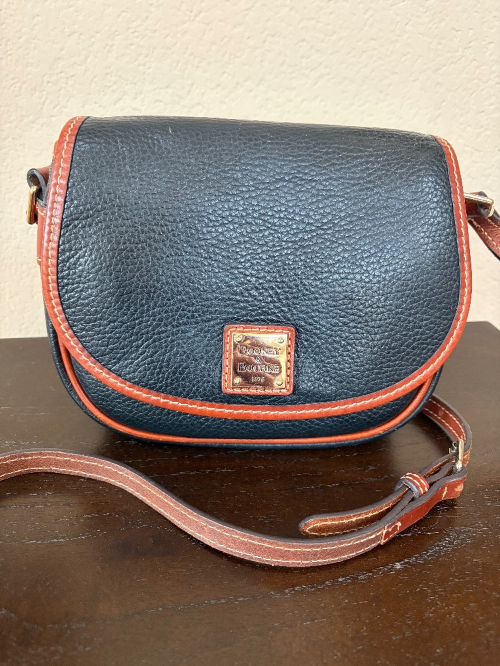 Dooney & Bourke Black Pebble Leather Flap Crossbody Bag with Brown Trim